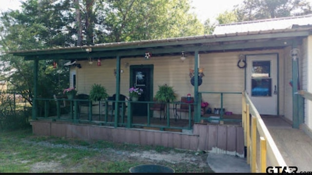 209 Kildare Rd, Linden, TX 75563 - back of property featuring metal roof