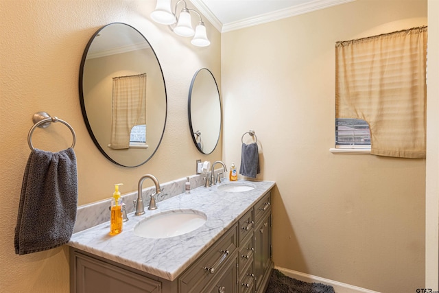 bathroom with ornamental molding and vanity