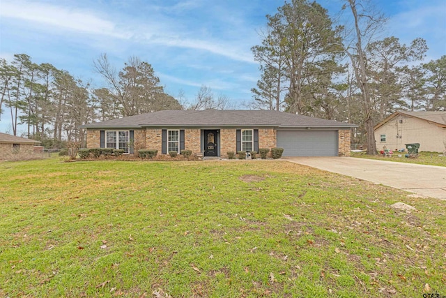 ranch-style house featuring a garage and a front yard