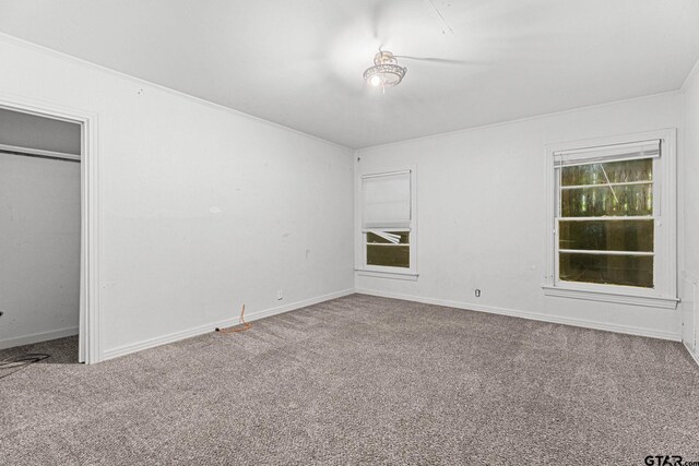 708 E Loftin St, Tyler, TX 75701 - unfurnished bedroom with carpet flooring