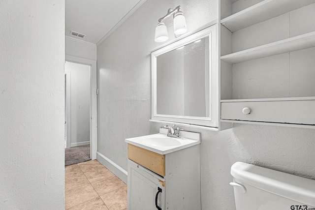 708 E Loftin St, Tyler, TX 75701 - bathroom with vanity, tile patterned flooring, and crown molding