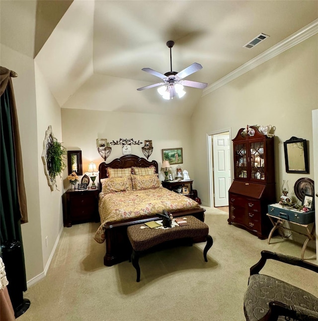 carpeted bedroom with lofted ceiling, visible vents, ornamental molding, baseboards, and ceiling fan