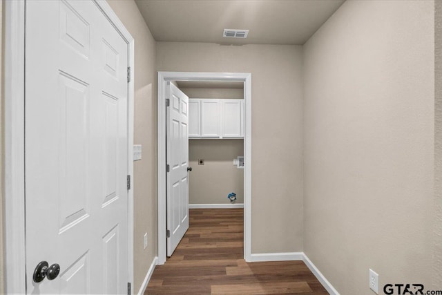 hall featuring dark wood-type flooring