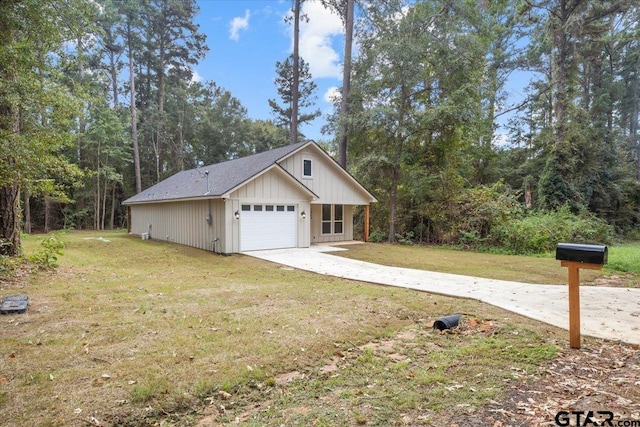 exterior space with a garage and a front yard