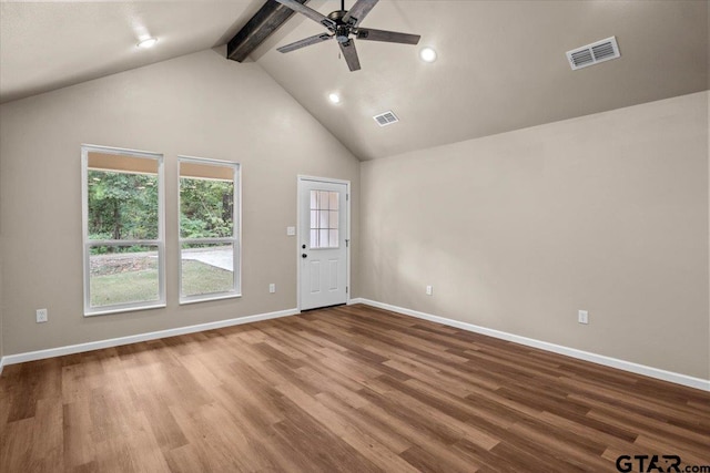 spare room with high vaulted ceiling, beamed ceiling, hardwood / wood-style flooring, and ceiling fan