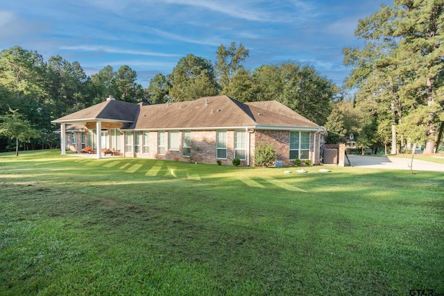 21585 Syrah Ln, Tyler, TX 75703 - single story home with a front yard and brick siding