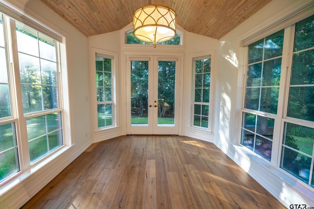 unfurnished sunroom with french doors, lofted ceiling, and wooden ceiling