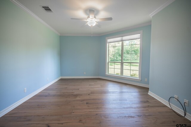 21585 Syrah Ln, Tyler, TX 75703 - spare room with a ceiling fan, wood finished floors, ornamental molding, and baseboards