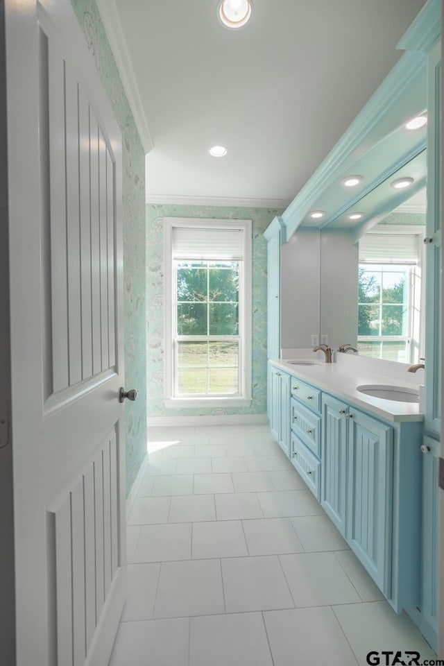 bathroom with tile patterned flooring, vanity, and ornamental molding