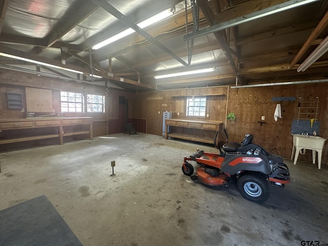 garage with a workshop area