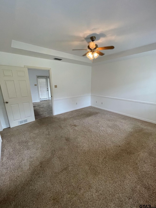 120 An County Road 4287, Palestine, TX 75803 - empty room featuring a ceiling fan, dark colored carpet, and visible vents