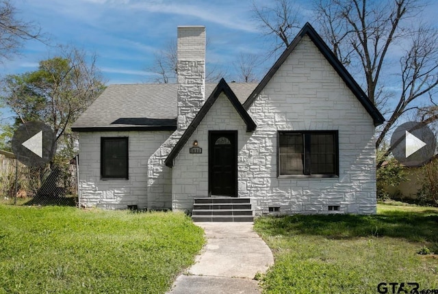 1430 Glenwood, Tyler, TX 75701 - view of front facade with stone siding, crawl space, a chimney, a front lawn, and roof with shingles