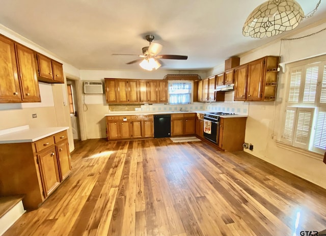 102 Gordon Dr, Crockett, TX 75835 - kitchen featuring black appliances, brown cabinetry, a ceiling fan, hardwood / wood-style flooring, and open shelves
