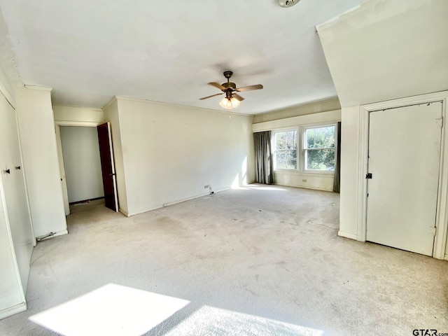 102 Gordon Dr, Crockett, TX 75835 - spare room with a ceiling fan and light colored carpet