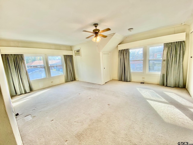 102 Gordon Dr, Crockett, TX 75835 - carpeted empty room with a ceiling fan, a wall mounted AC, a smoke detector, and crown molding