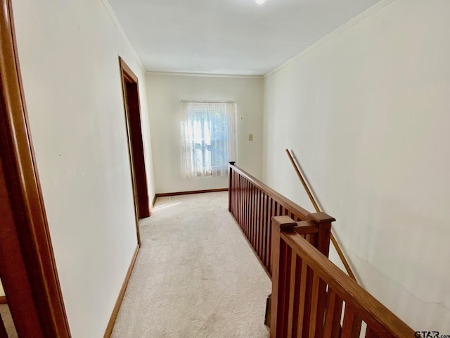 102 Gordon Dr, Crockett, TX 75835 - hall featuring an upstairs landing, light carpet, and crown molding