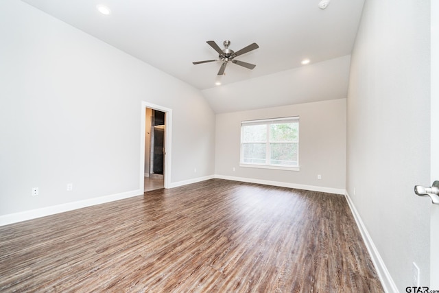 spare room featuring hardwood / wood-style flooring, ceiling fan, and lofted ceiling