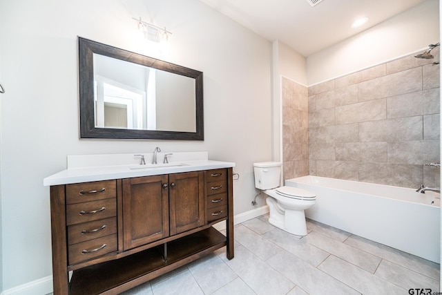 full bathroom with tile patterned floors, vanity, toilet, and tiled shower / bath