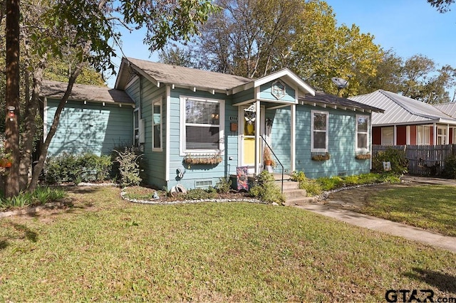 view of front facade with a front yard