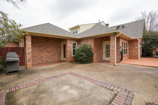 rear view of house featuring a patio