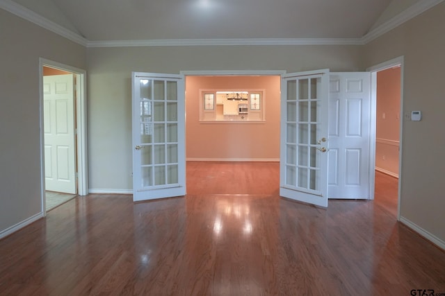 unfurnished room with french doors, dark hardwood / wood-style flooring, vaulted ceiling, and crown molding