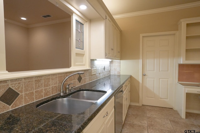 kitchen with tasteful backsplash, dishwasher, sink, and ornamental molding