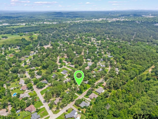 1805 Greenway St, Gilmer, TX 75644 - drone / aerial view of a heavily wooded area