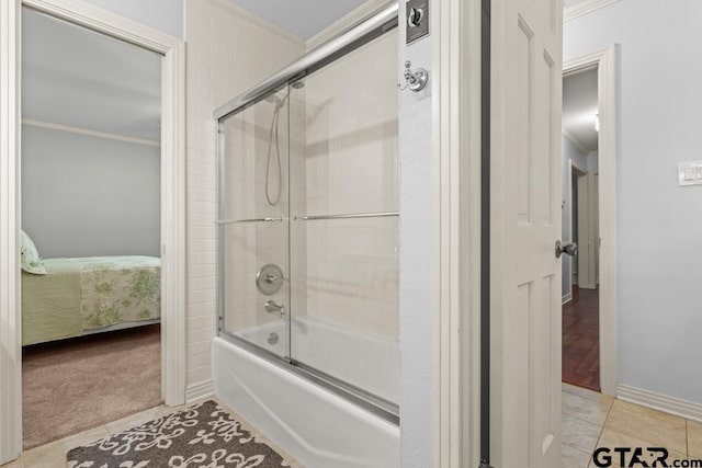 1805 Greenway St, Gilmer, TX 75644 - ensuite bathroom with combined bath / shower with glass door, ornamental molding, and baseboards