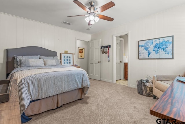 1805 Greenway St, Gilmer, TX 75644 - bedroom featuring carpet floors, ceiling fan, and connected bathroom