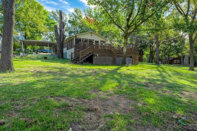 view of yard featuring a deck