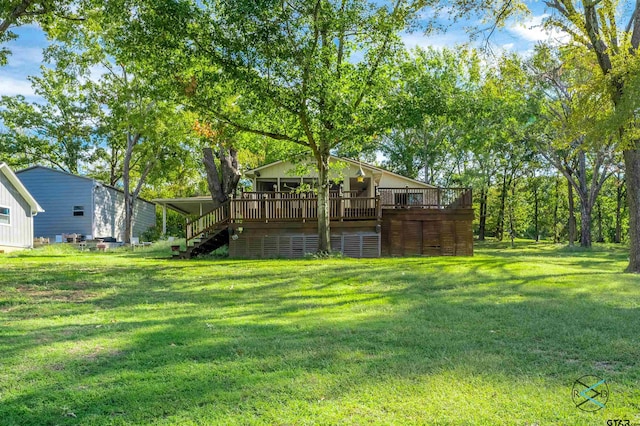 view of yard featuring a deck