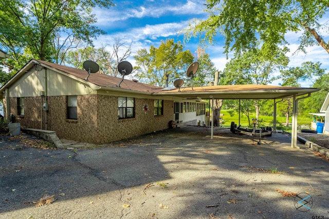 exterior space with a carport