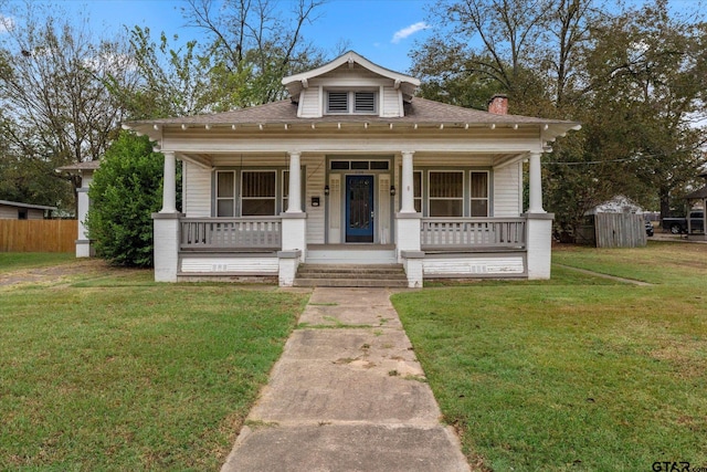 bungalow-style house featuring a front yard and a porch