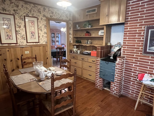 dining space featuring dark wood-type flooring