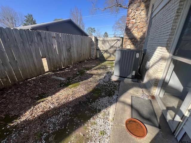 view of yard featuring central AC