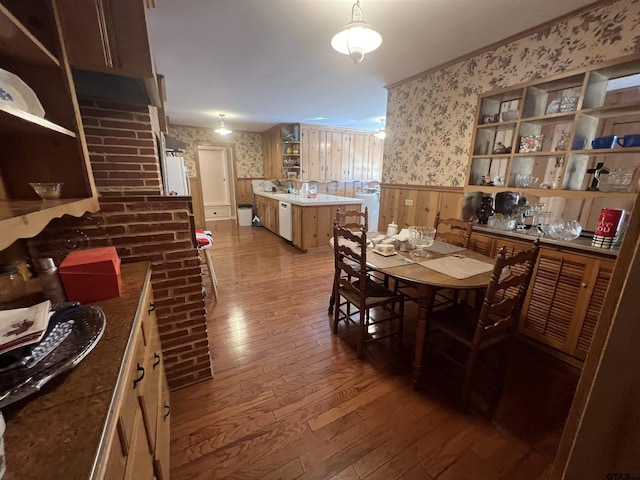 dining space with hardwood / wood-style floors