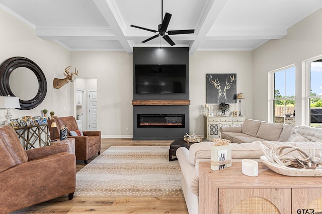 12293 Harlon St, Flint, TX 75762 - living room with wood finished floors, beam ceiling, coffered ceiling, a glass covered fireplace, and ceiling fan