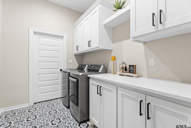 12293 Harlon St, Flint, TX 75762 - laundry area featuring washing machine and clothes dryer and cabinet space