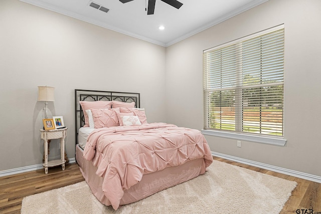 12293 Harlon St, Flint, TX 75762 - bedroom with crown molding, wood finished floors, recessed lighting, and a ceiling fan