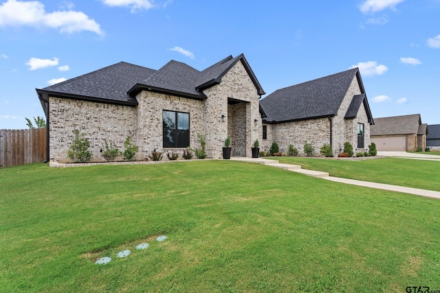 12293 Harlon St, Flint, TX 75762 - french country home with brick siding and roof with shingles