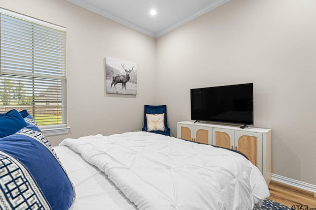 12293 Harlon St, Flint, TX 75762 - bedroom featuring wood finished floors and crown molding