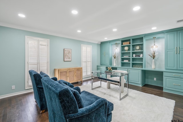 office space featuring recessed lighting, dark wood finished floors, and built in study area