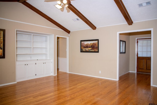 3505 Cloverdale Dr, Tyler, TX 75701 - unfurnished living room featuring light wood-type flooring, ceiling fan, built in shelves, and baseboards