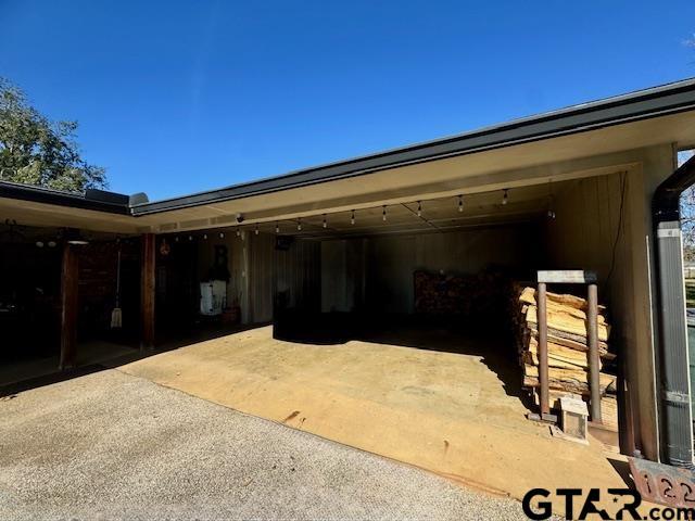 12239 Lovers Ln, Larue, TX 75770 - view of parking featuring a garage