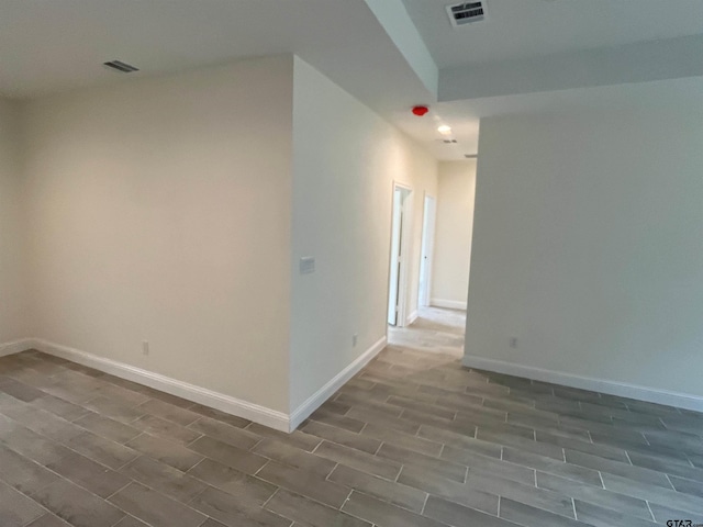 225 S Quille Ave, Mount Pleasant, TX 75455 - spare room with wood finished floors and baseboards