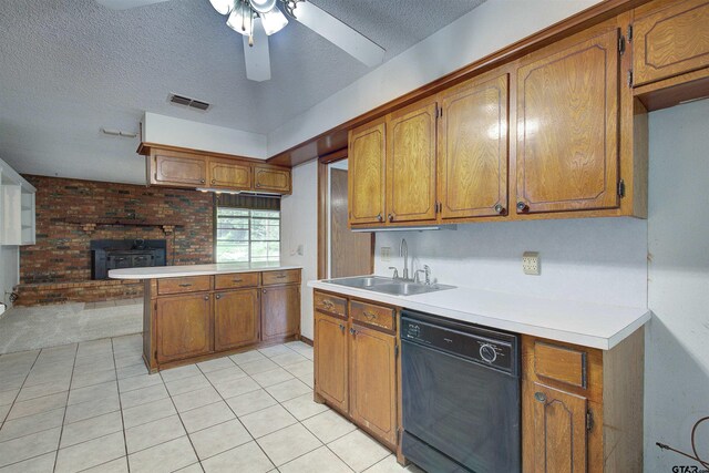 19870 Fm 1253, Lindale, TX 75771 - kitchen with dishwasher, brown cabinetry, ceiling fan, light countertops, and a textured ceiling