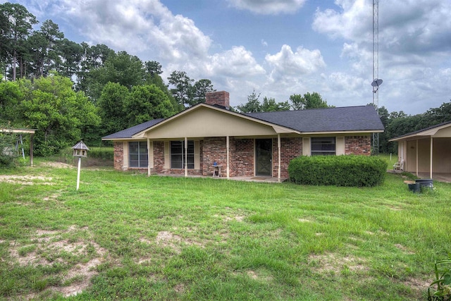 19870 Fm 1253, Lindale, TX 75771 - view of front of house with a chimney, a front lawn, and brick siding