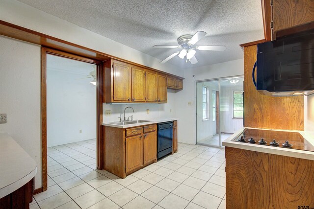 19870 Fm 1253, Lindale, TX 75771 - kitchen featuring ceiling fan, black appliances, brown cabinetry, and a textured ceiling