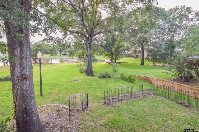 view of yard with a water view