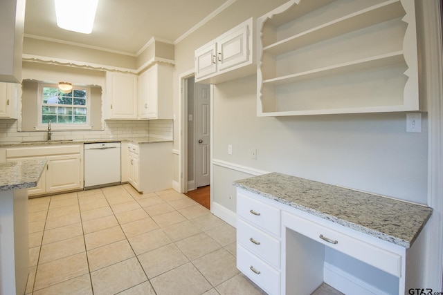 kitchen featuring white cabinets, dishwasher, and tasteful backsplash